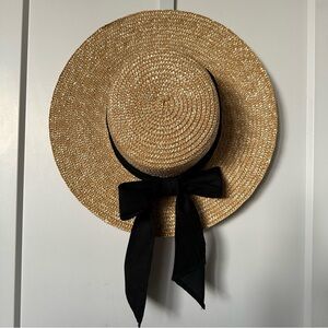 Elegant Straw Hat with Black Ribbon